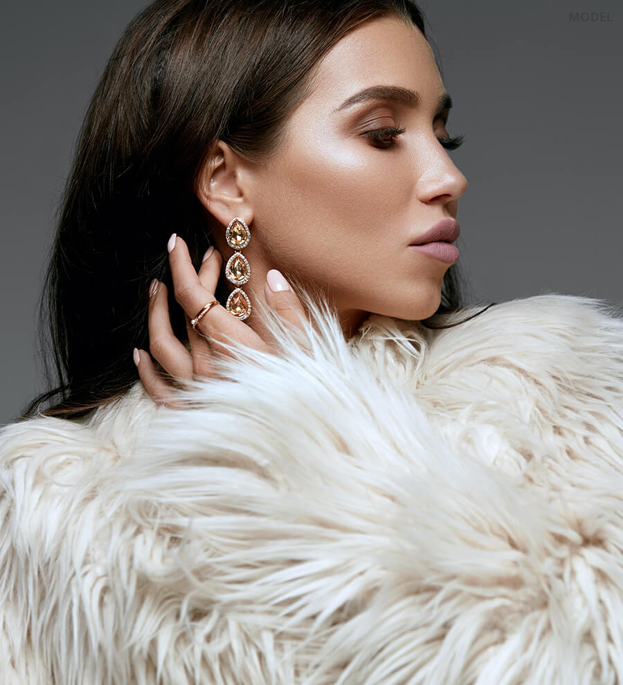 Elegant woman in fur coat